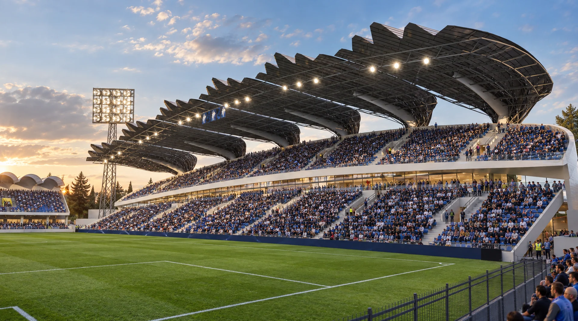 Spectator terraces beneath the canopy — East Stand of Podgorica City Stadium